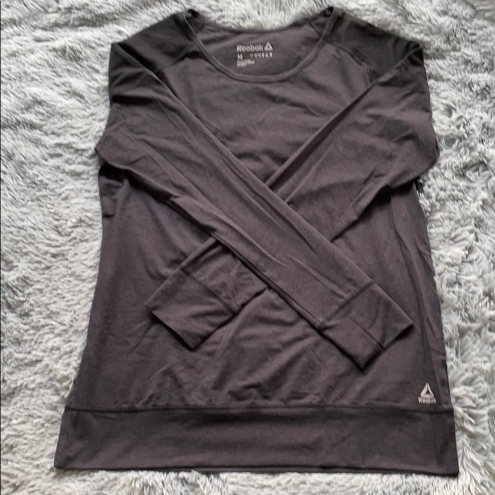 Grey Reebok long sleeved tee shirt.